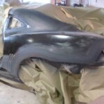 Photographs of a 2014 Chevrolet Camaro that was in an accident and repaired by Elite Paint & Body Shop in West Palm Beach Florida